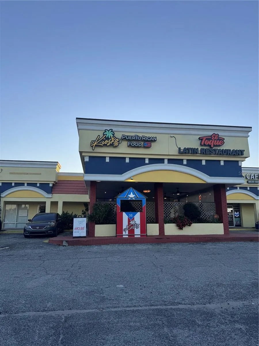 Just steps away from a small shopping plaza with a variety of dining option