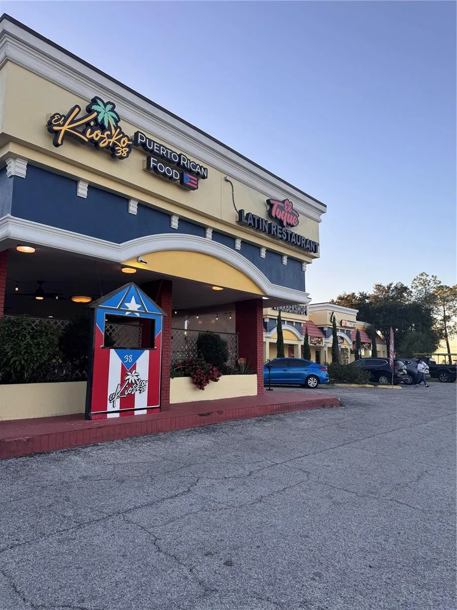 Just steps away from a small shopping plaza with a variety of dining option
