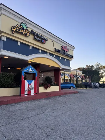 Just steps away from a small shopping plaza with a variety of dining option