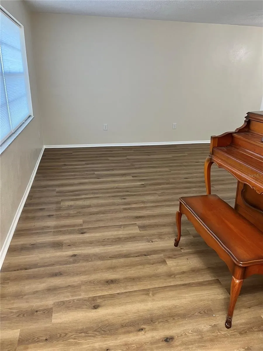 New Easy Care Luxury Vinyl in Neutral tones throughout the home.