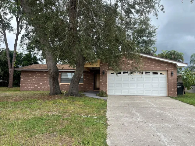 Completely Remodeled 3 bed/2bath/2 car garage brick ranch style home in Desirable Sun Tree Estates Clearwater, FL