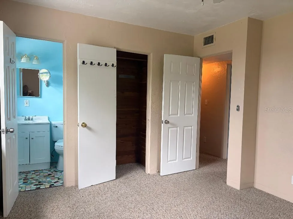 Primary Bedroom w/ 1/2 Bath