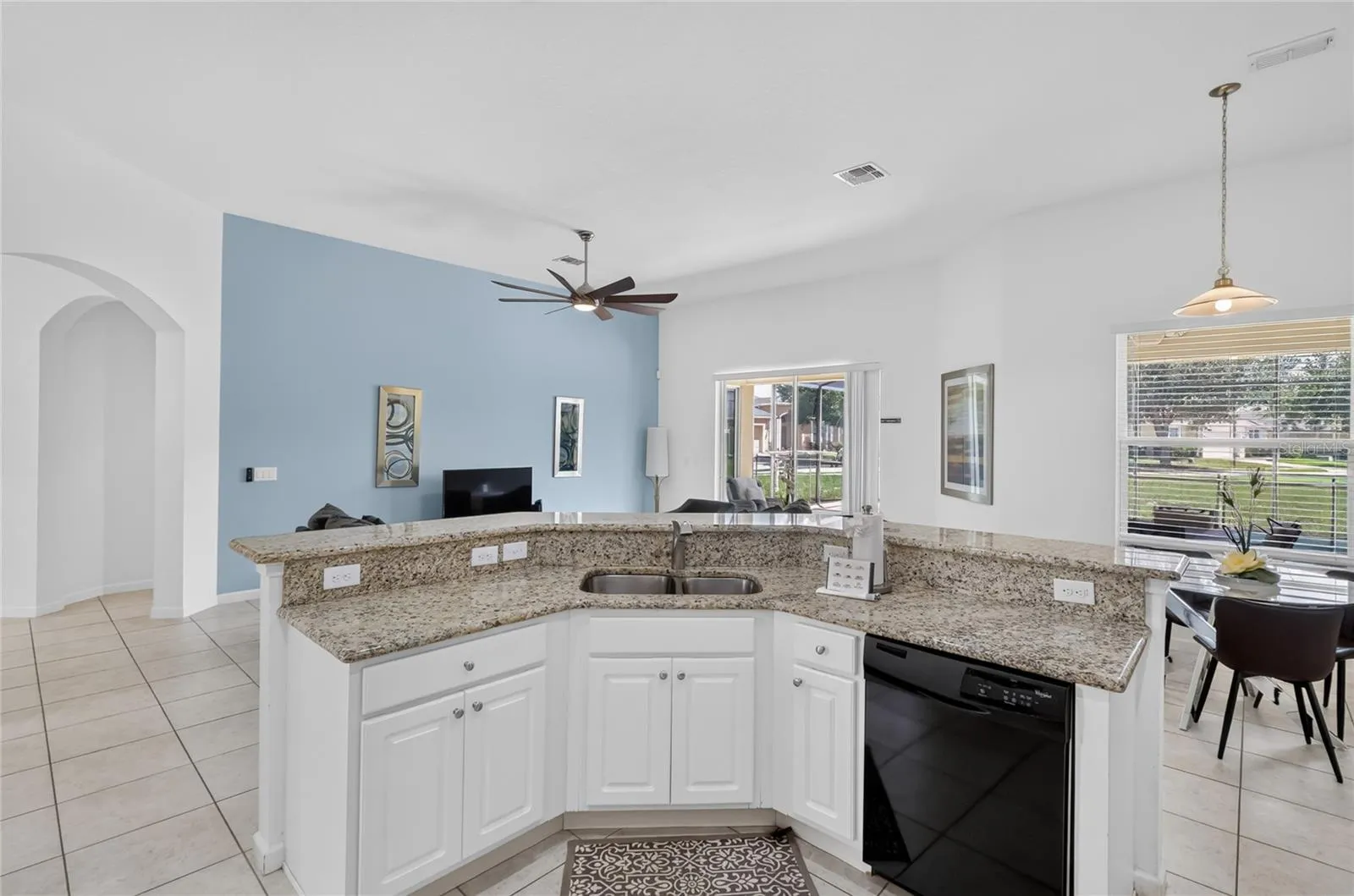 Looking towards the breakfast nook on the right and family room straight ahead