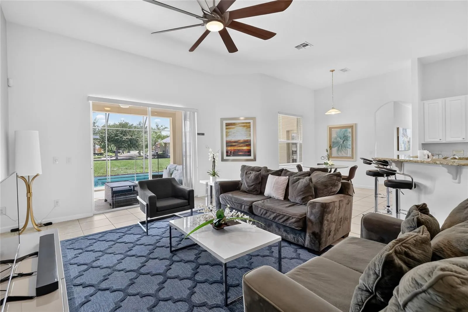 Large family room next to the pool