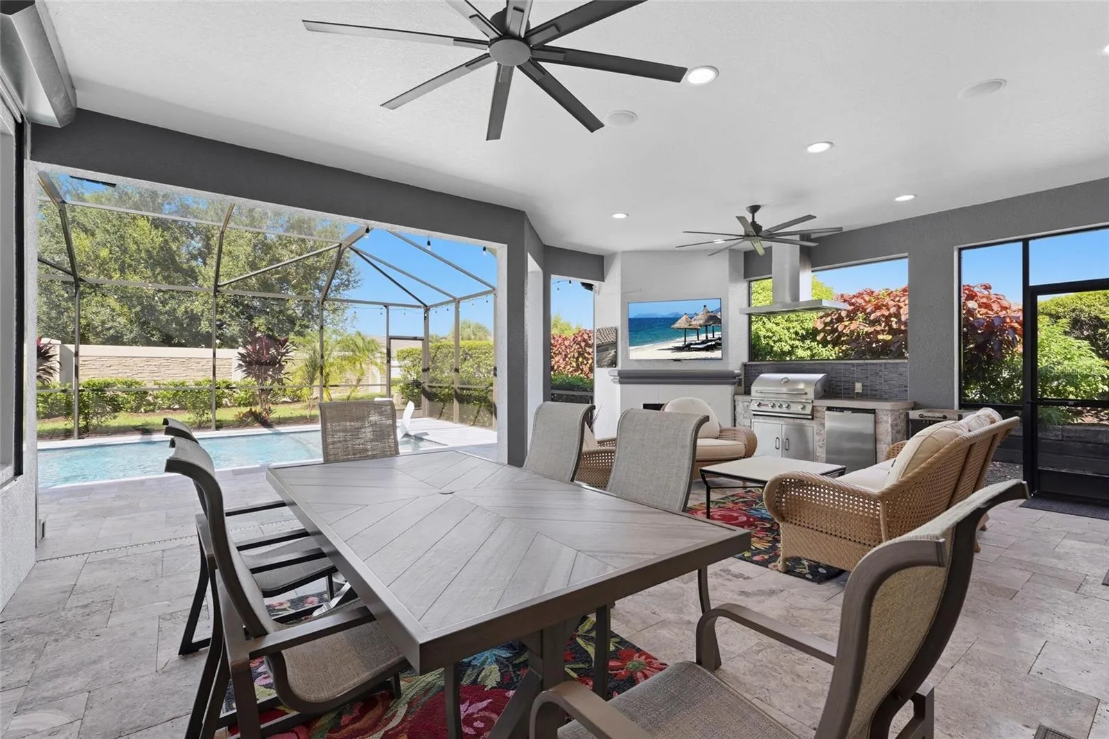 Outdoor lanai area with ample seating room plus outdoor kitchen