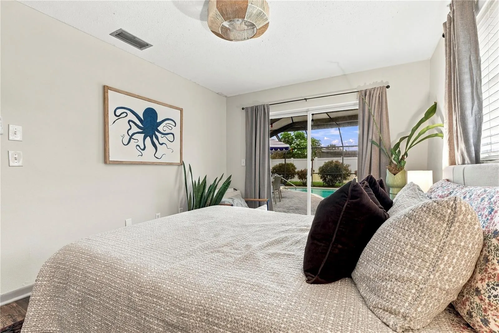 Bedroom 4 with pool patio access