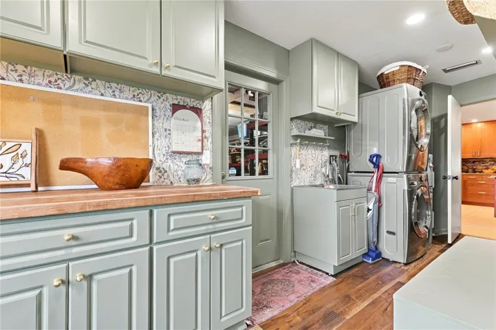 Laundry room with sink access to garage