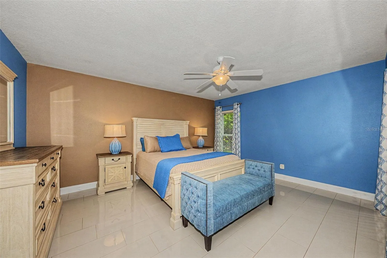 Primary Bedroom w/porcenlain tile