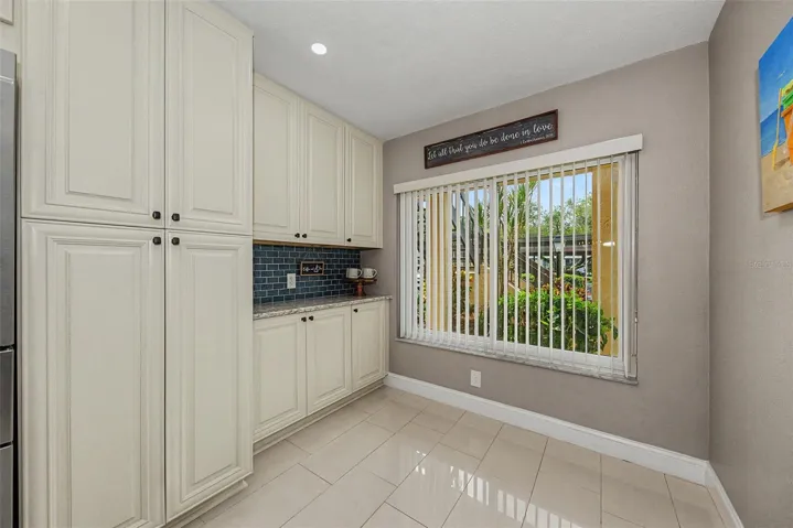 Kitchen with pantry cabinet and pull-out drawers