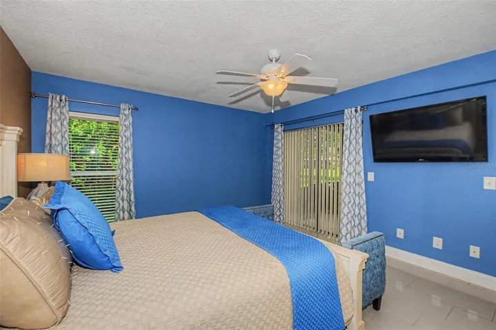 Primary Bedroom w/slider to Florida Room