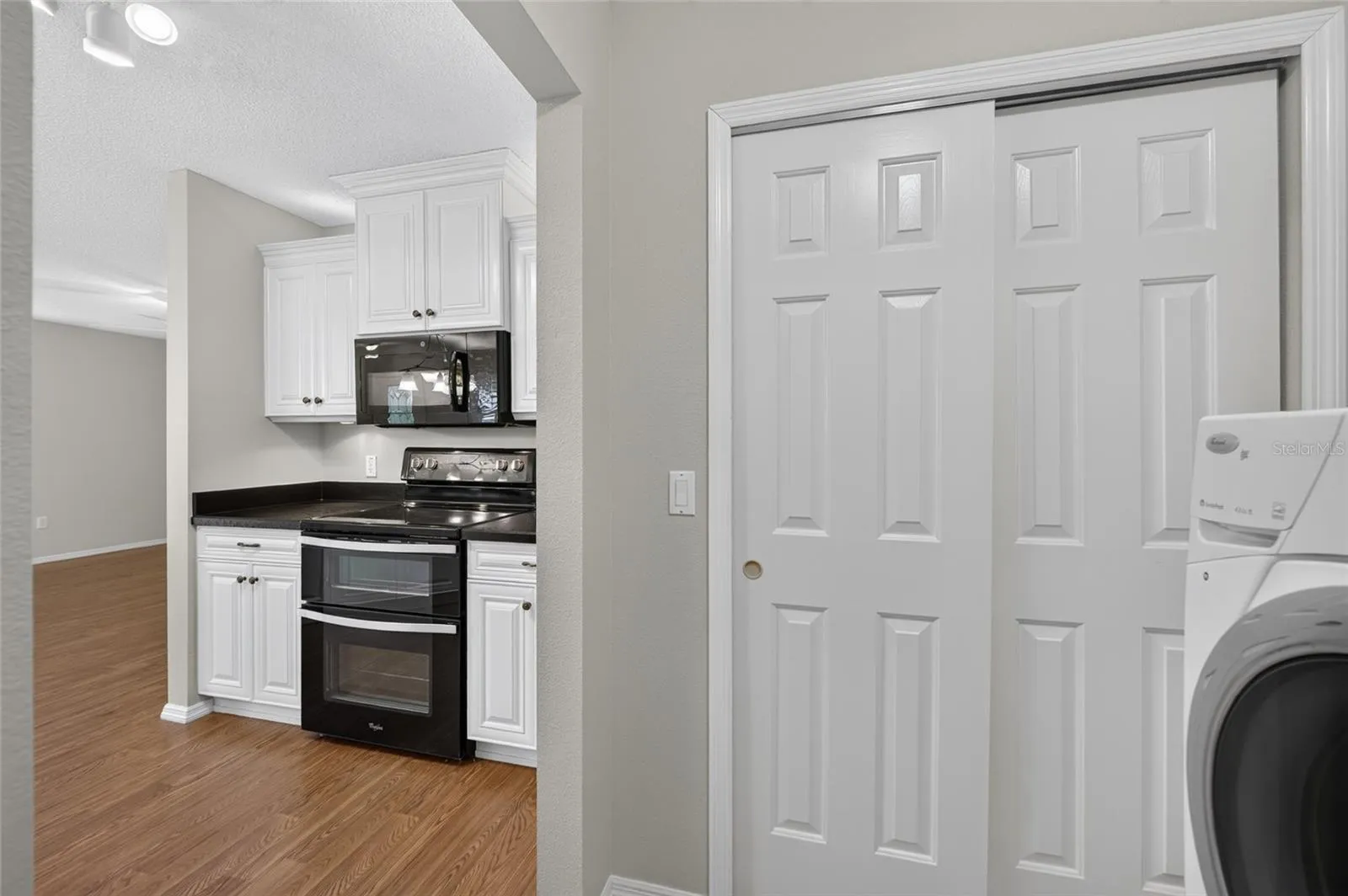 PANTRY &/or STORAGE - Double-door pantry/storage closet is conveniently located near the kitchen.
