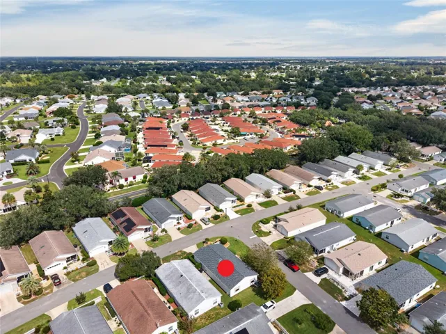 AERIAL – Looking Northeast – Mature oaks shade the neighborhood, with the SANTO DOMINGO POSTAL STATION right around the corner and Spanish Springs Town Square easily reached within 8 mins via El Camino Real.