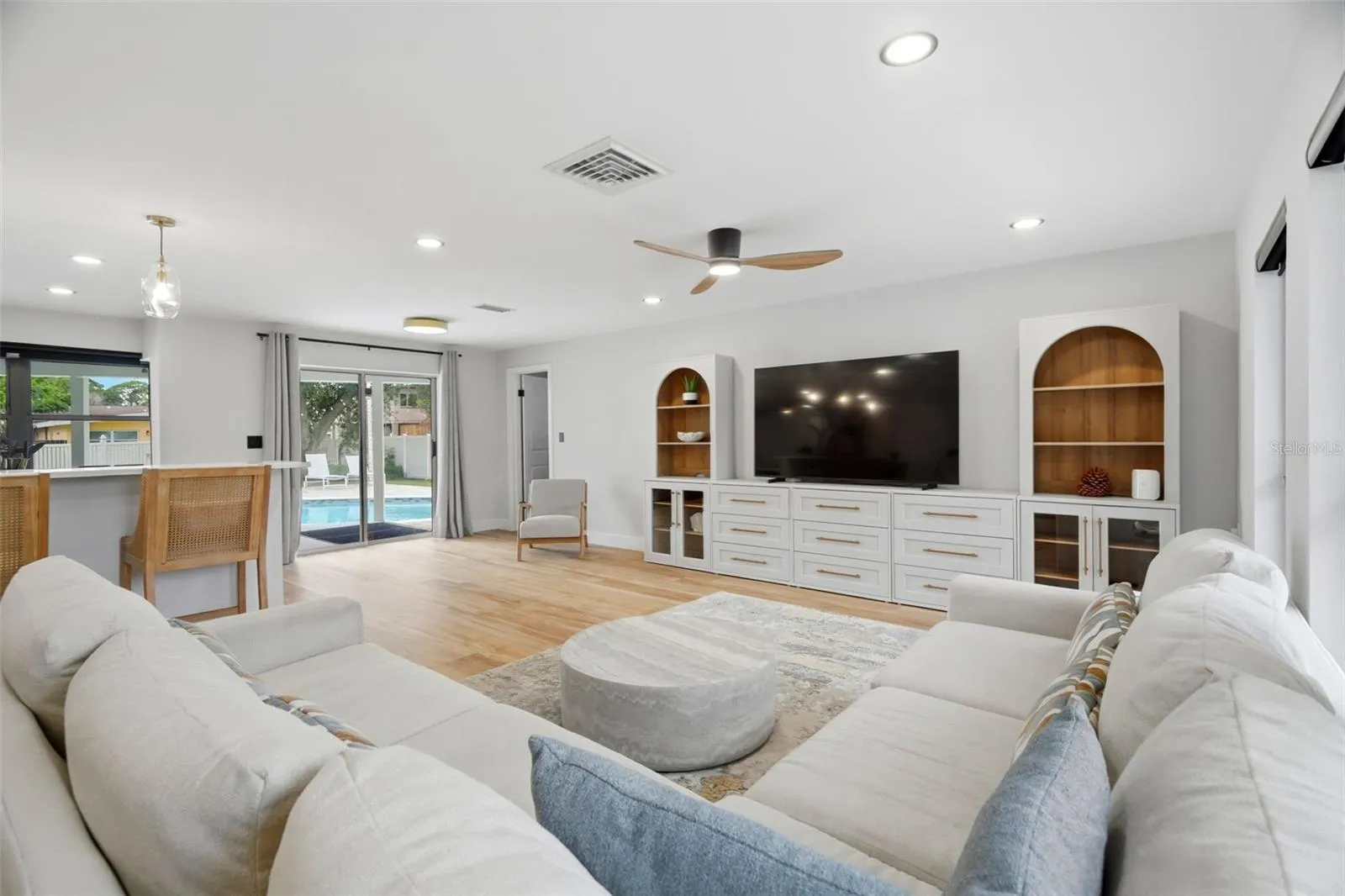 Living Room pointing toward Primary Bedroom and Eat-in Space next to Kitchen
