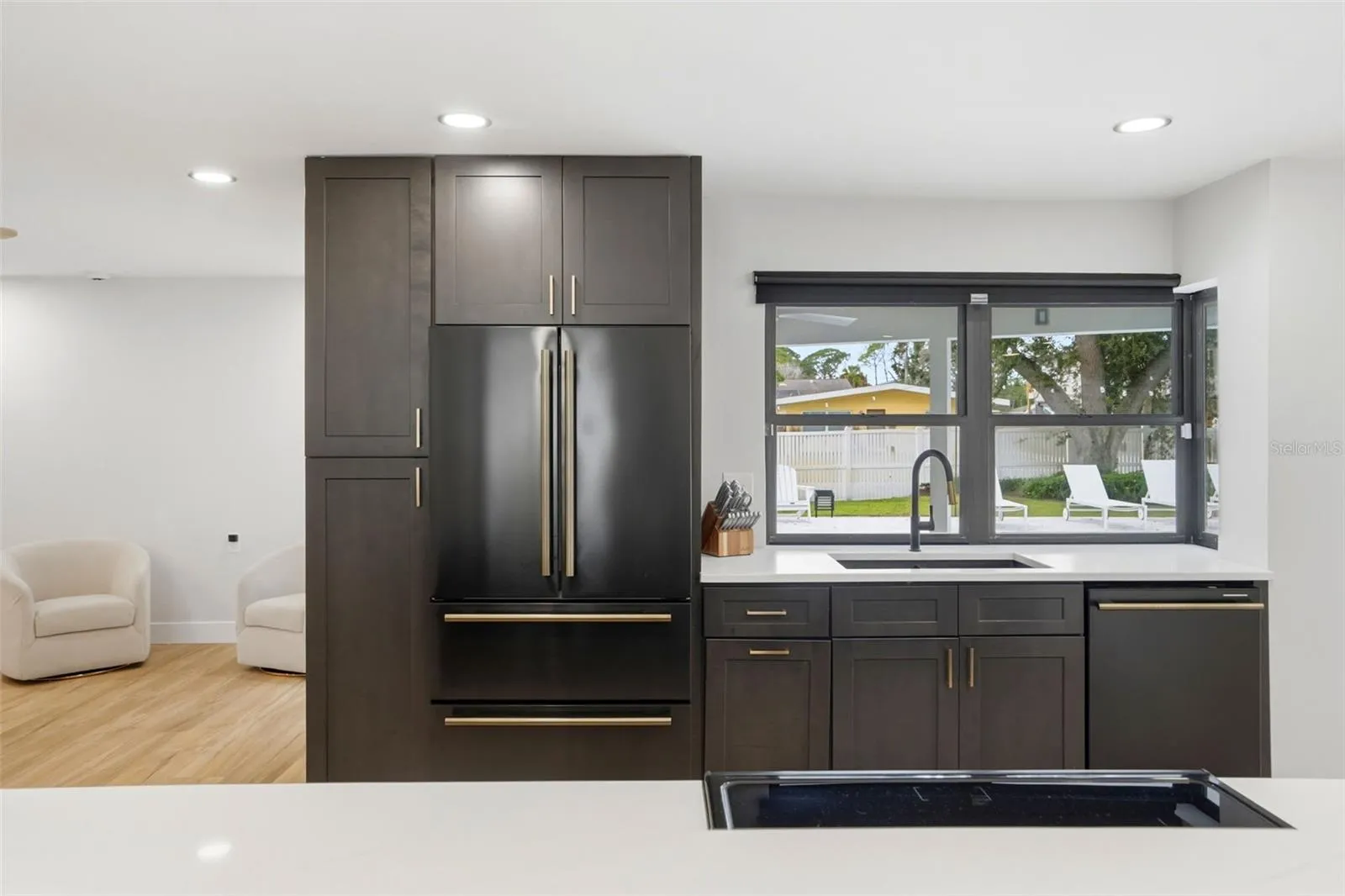 Pantry Cabinets with Pull-out Shelving, Forno Appliances, Fridge with Ice Maker