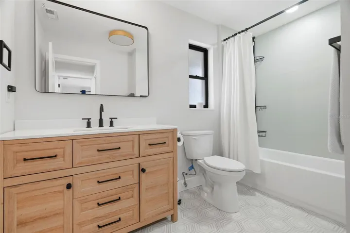 Guest Bathroom with Beautiful vanity and tile work