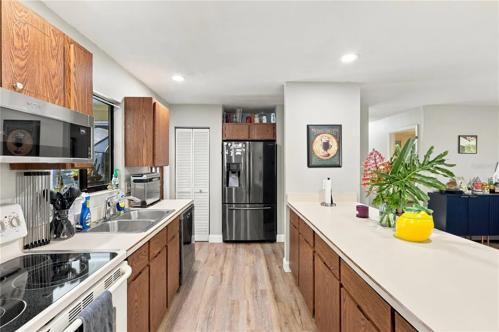 Kitchen- Lots of Storage! Beautiful Breakfast Bar- Open Concept!