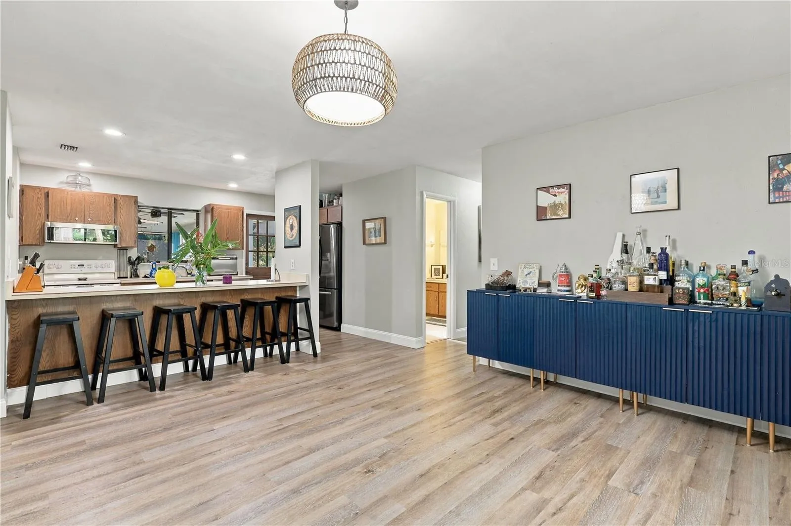 Second Living Area or Large Formal Dining Room, Breakfast Bar Overlooking the Kitchen.