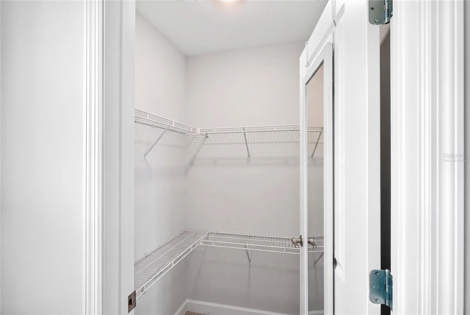 Upstairs 2nd bedroom closet virtually staged