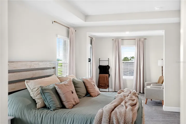 Primary bed facing sitting area