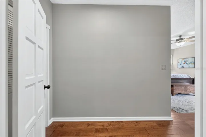 Door off of Living Room into the Primary Suite