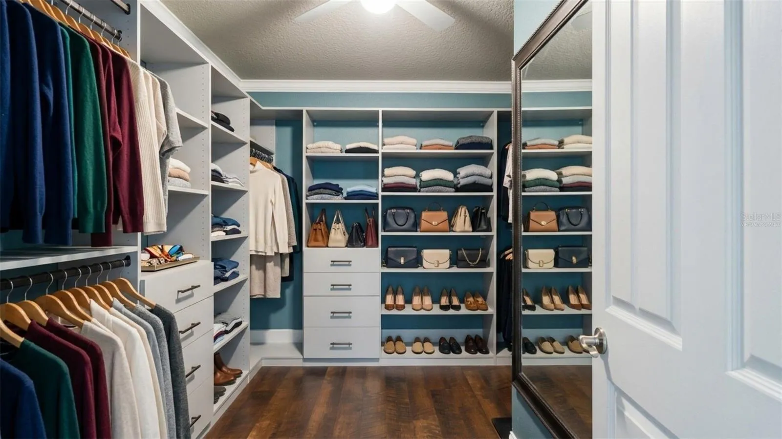 Virtually staged. Primary Walk in closet
