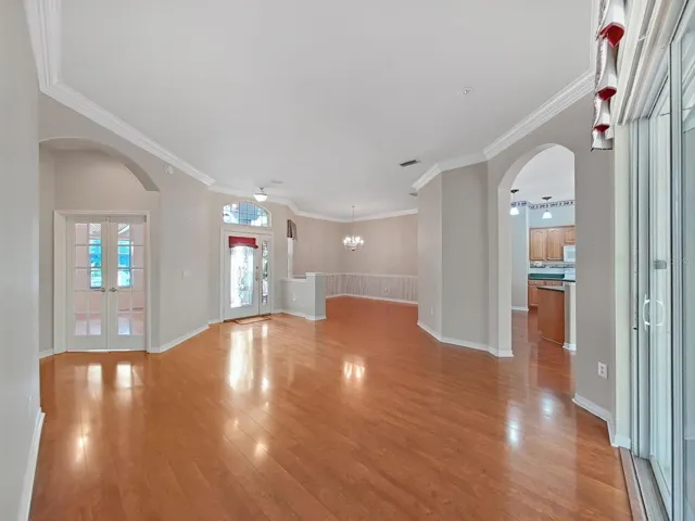 L-R:    Office ~ Front Entry ~ Dining Room ~ Kitchen ~ Living Room Area