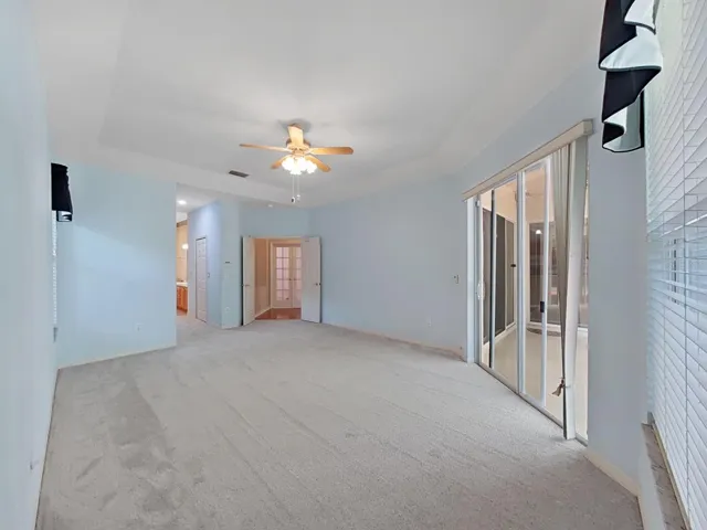 Primary Bedroom ~ Doors Open to Lanai