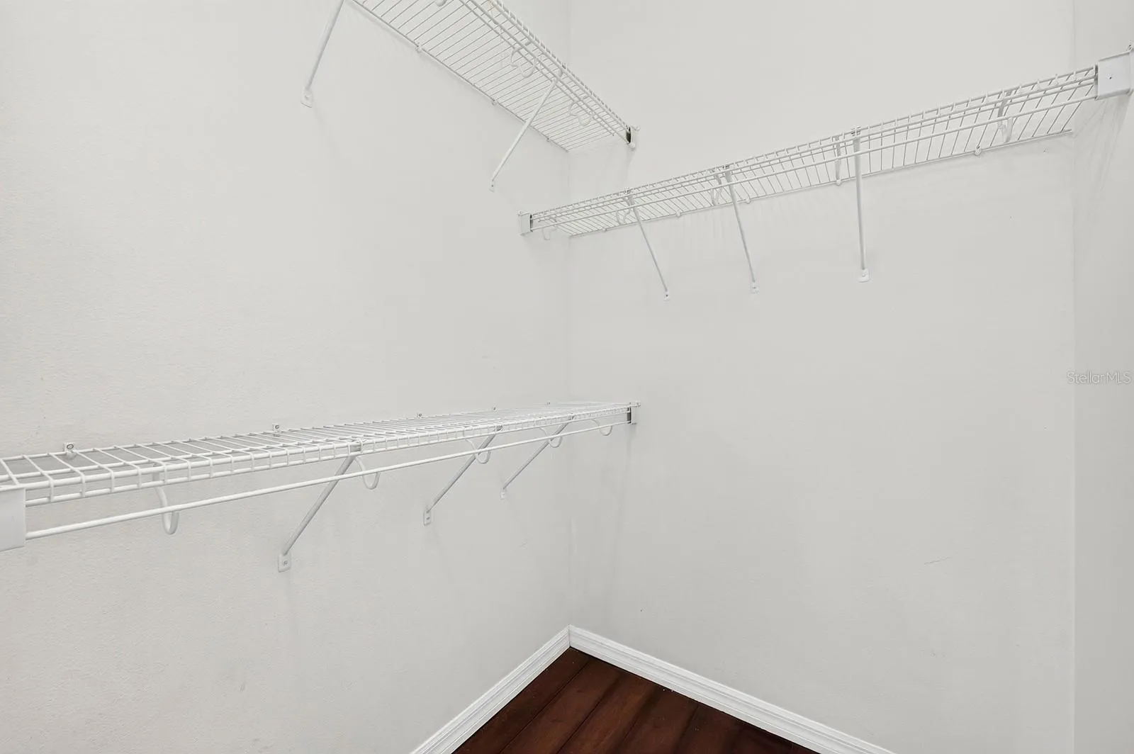 Primary suite walk-in closet.