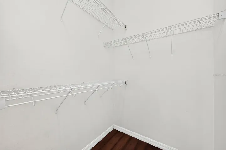 Primary suite walk-in closet.
