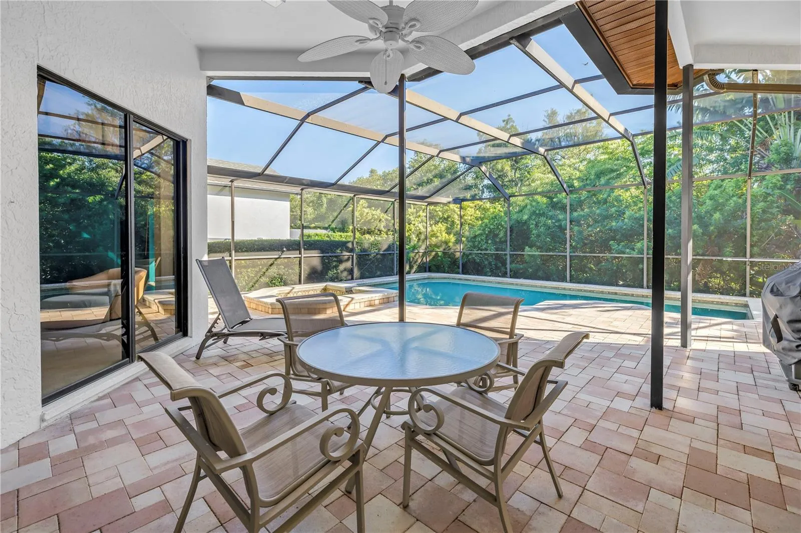 Featuring a fully covered outdoor living area and a private backyard perfect for entertaining.