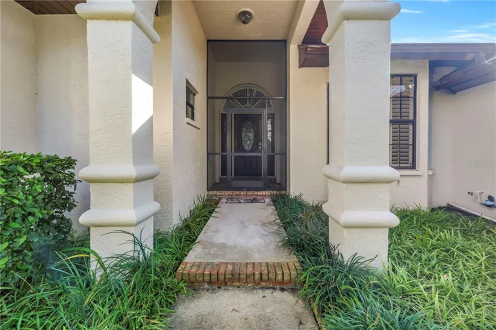 This custom-designed beauty is a one-of-a-kind luxury home that features a super impressive entryway and foyer.