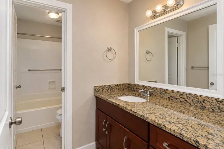Bathroom with tub and shower