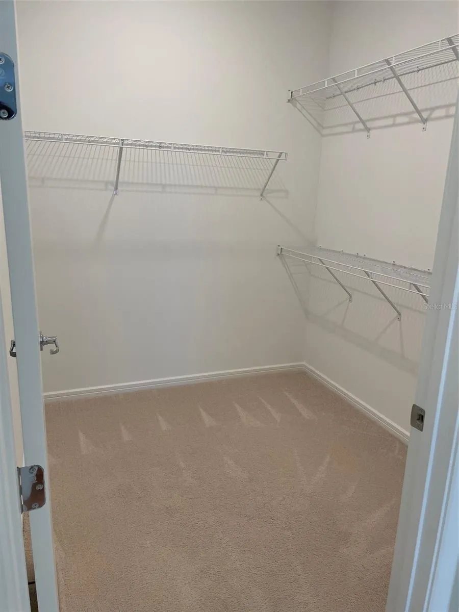 Walk in closet in master bedroom