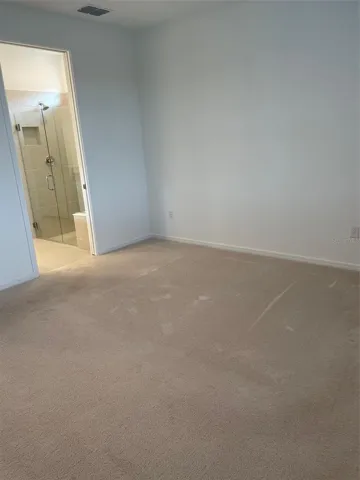 Reverse view of master bedroom into the master bath