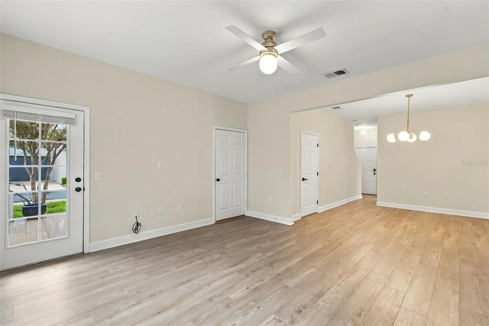 Living Room/Dining Room Combo, with access to Garage &amp; Back Patio