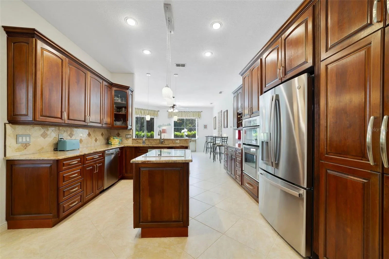 Beautiful Kitchen with center Stove Top !