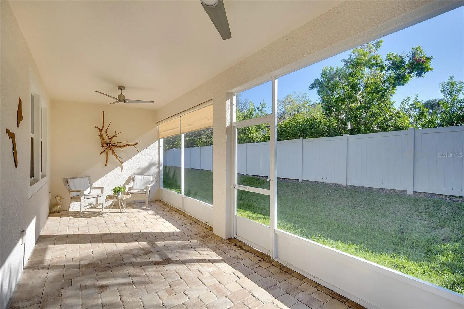 Expanded covered lanai, screened with private view.