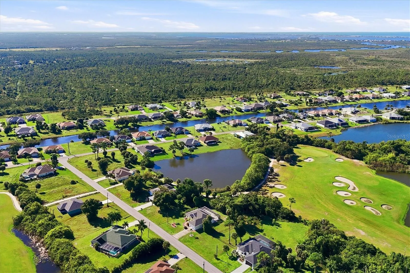 Golf Course Abutts Lake