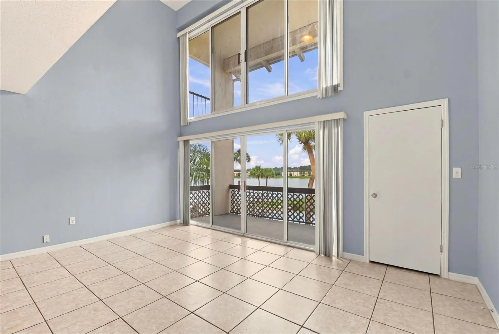 Storage closet next to sliding doors