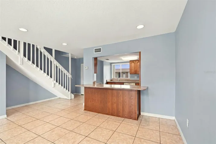 Dining room to kitchen with extra can lighting