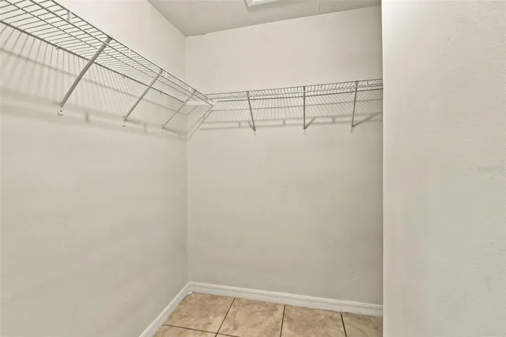 To right is Walk-in closet