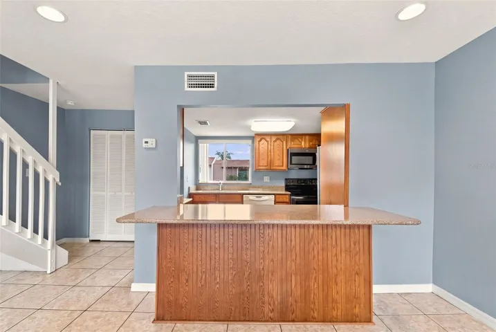 Breakfast bar with stone countertop