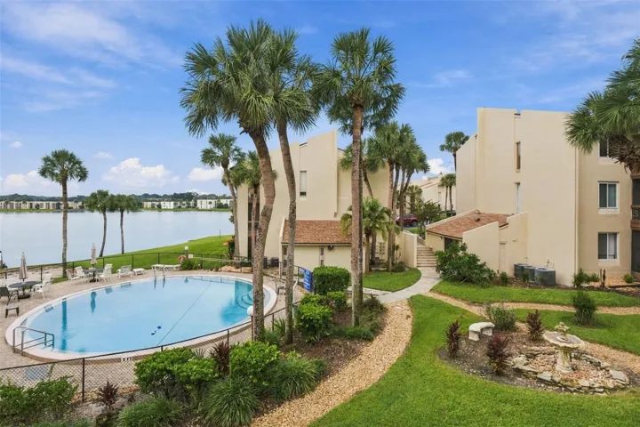 View off of the balcony of pool and LAKE