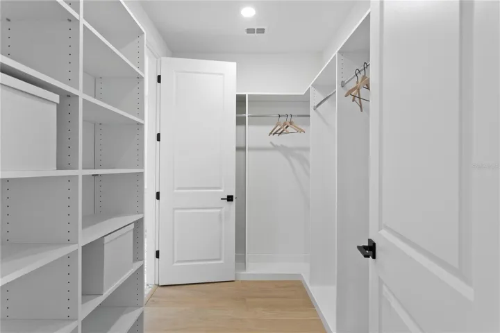 Primary Bedroom Closet 1