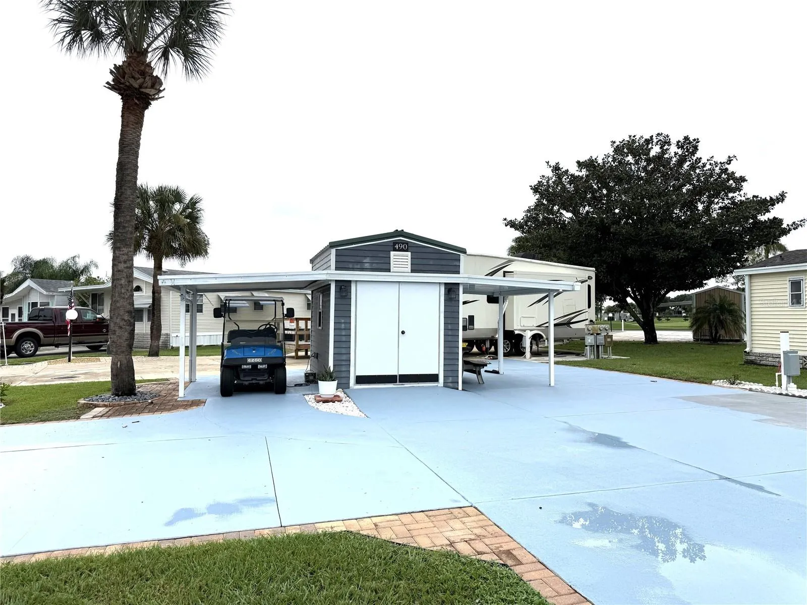 STORAGE SHED & GOLF CART