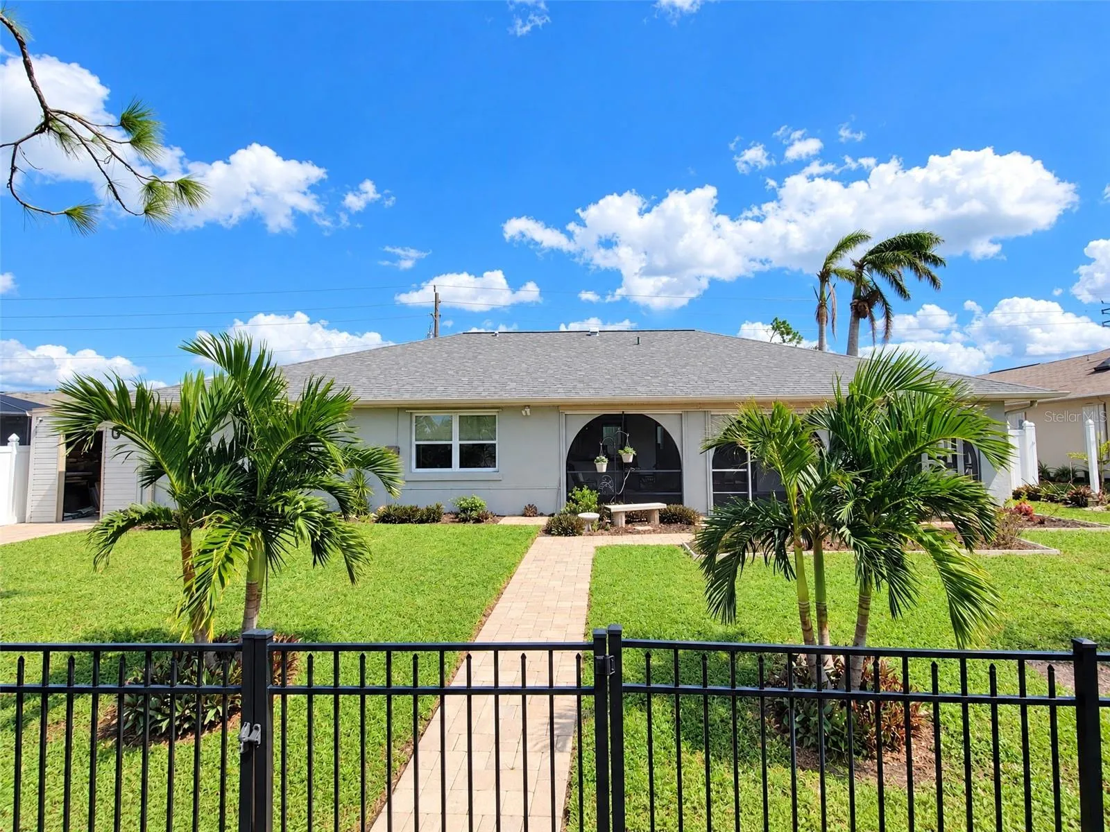 Rear Exterior and Fenced Yard