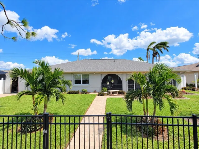 Rear Exterior and Fenced Yard