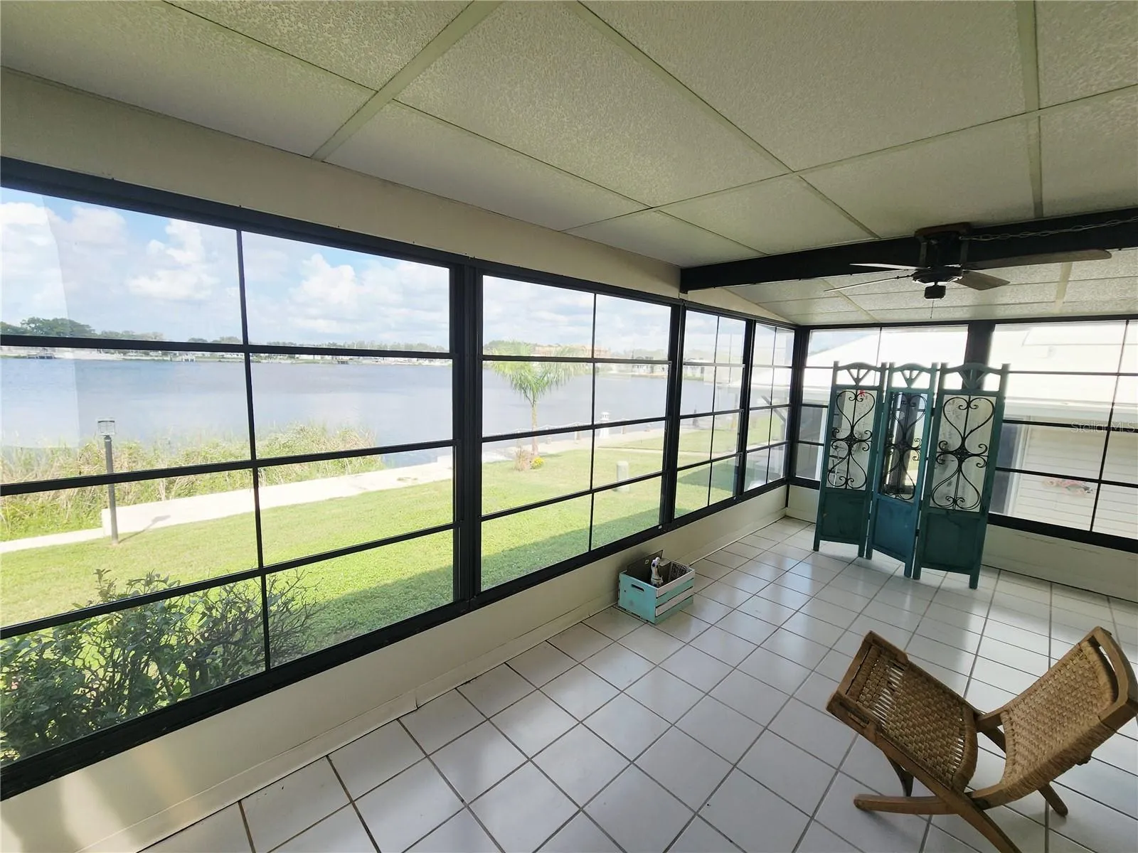 Florida Room w/awesome view of lake.