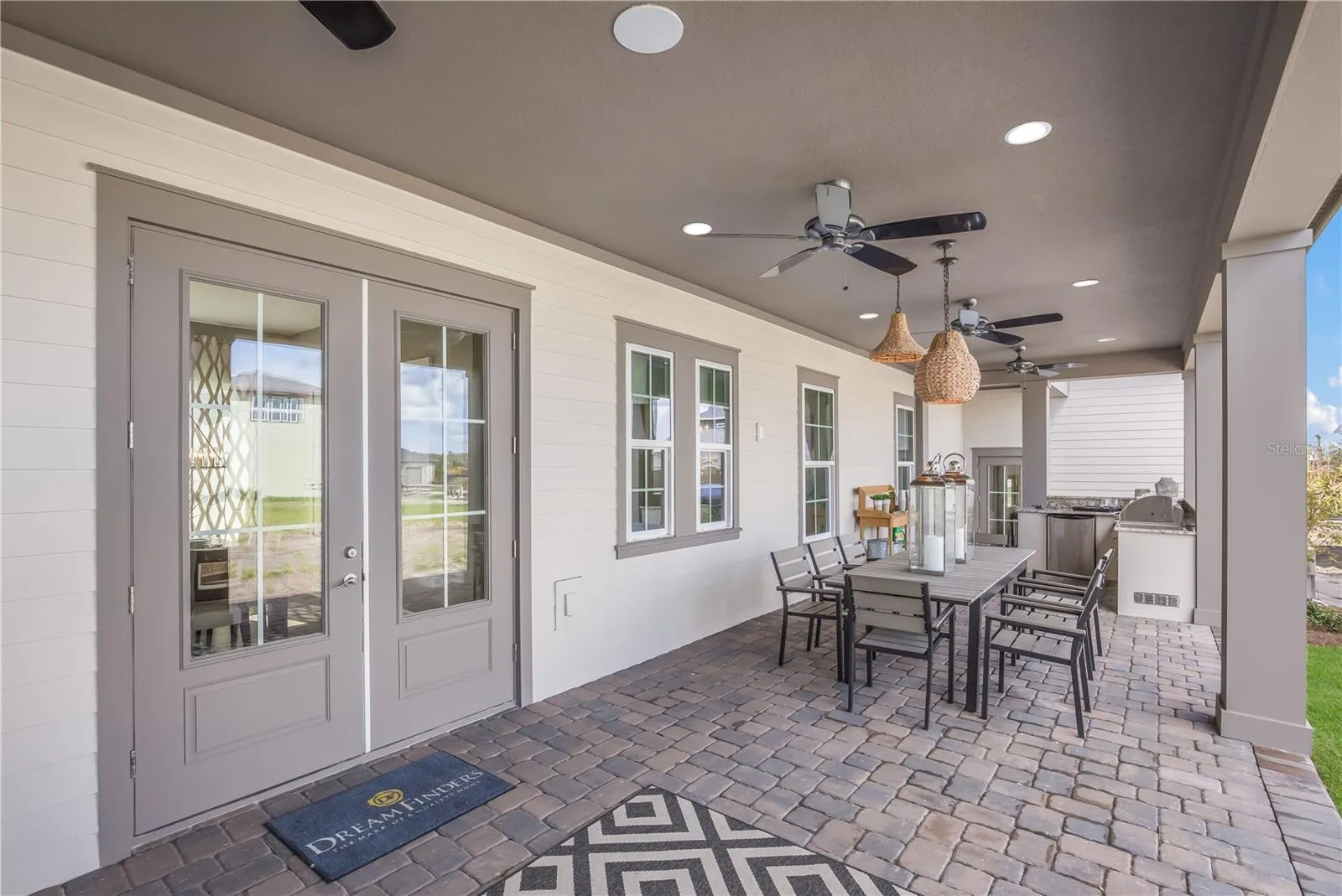 The sample photos included are of the model home and are meant to showcase the craftsmanship and design quality.