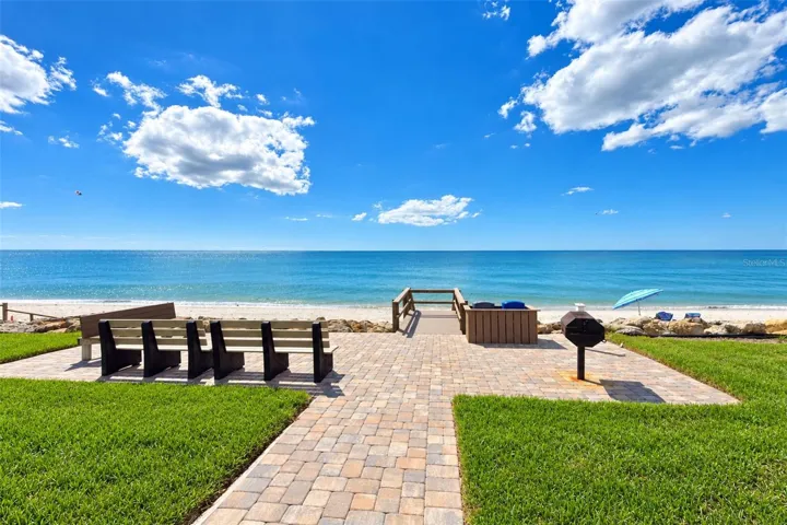 Grilling area with steps to the beach.